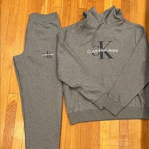 Calvin Klein men Gray Joggers size small and Hoodie size Med